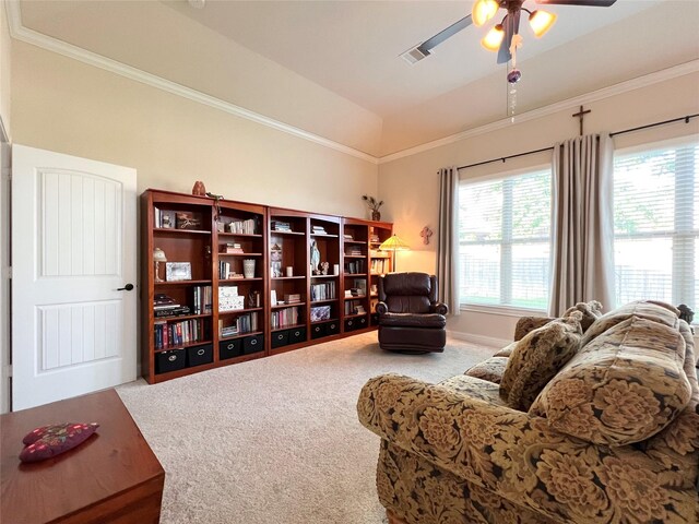 115 Carriage Ct, Magnolia, TX 77354 - living area with carpet floors, a ceiling fan, ornamental molding, and vaulted ceiling