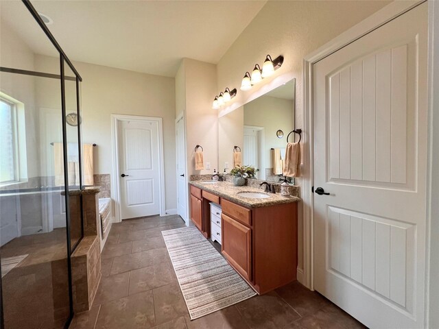 115 Carriage Ct, Magnolia, TX 77354 - full bath with a garden tub, double vanity, a stall shower, and tile patterned flooring