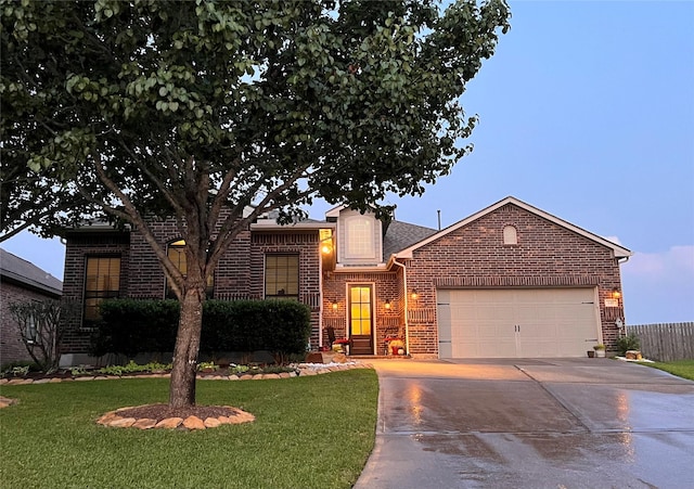 115 Carriage Ct, Magnolia, TX 77354 - view of front of house featuring brick siding, driveway, a garage, and a front yard
