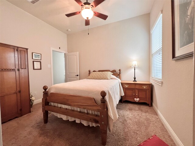 115 Carriage Ct, Magnolia, TX 77354 - bedroom with light carpet, multiple windows, baseboards, and ceiling fan