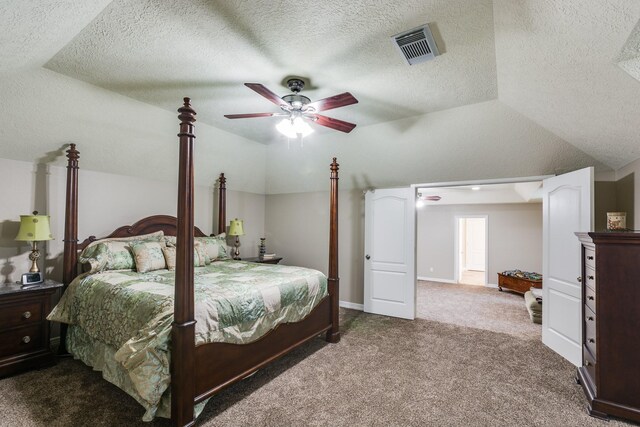 507 Oaks Grande Rd, Baytown, TX 77523 - bedroom with vaulted ceiling, carpet floors, a textured ceiling, and ceiling fan