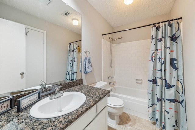 2515 Spring Dusk Ln, Spring, TX 77373 - full bath featuring toilet, vanity, shower / bathtub combination with curtain, a textured ceiling, and tile patterned floors