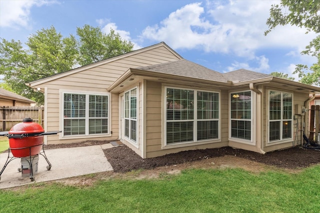 2515 Spring Dusk Ln, Spring, TX 77373 - back of house featuring a patio area and roof with shingles