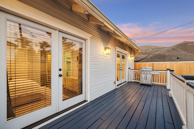 704 Cordell St, Houston, TX 77009 - deck at dusk with french doors and a grill