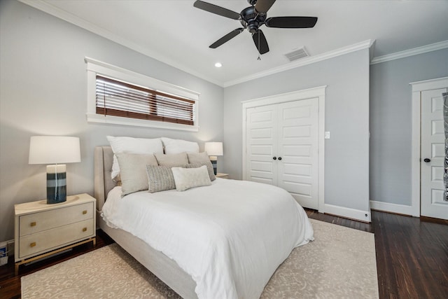 704 Cordell St, Houston, TX 77009 - bedroom featuring baseboards, wood finished floors, crown molding, a closet, and ceiling fan