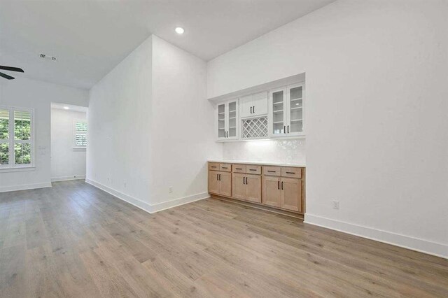 16383 Placid Stream St, Conroe, TX 77302 - spare room featuring light wood-style flooring, baseboards, ceiling fan, and recessed lighting