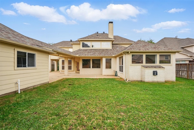 5419 Eagle Trace Ct, Sugar Land, TX 77479 - rear view of house featuring a patio area, a chimney, brick siding, and roof with shingles