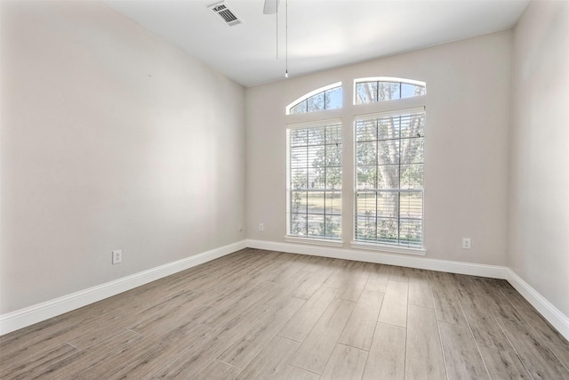3106 Five Oaks Dr, Missouri City, TX 77459 - spare room featuring wood finished floors and ceiling fan