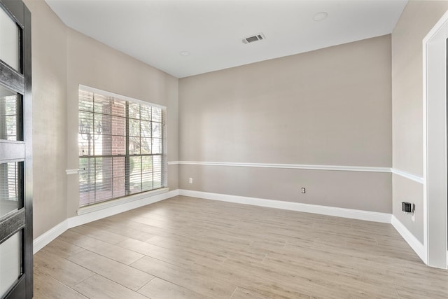 3106 Five Oaks Dr, Missouri City, TX 77459 - empty room featuring light wood-style flooring and baseboards