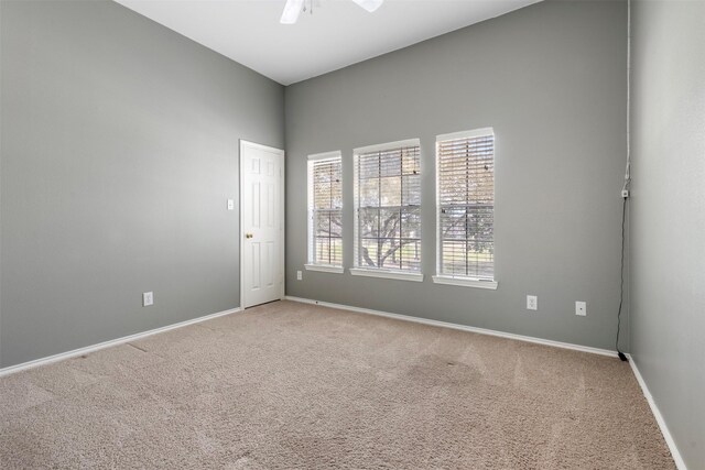 3106 Five Oaks Dr, Missouri City, TX 77459 - carpeted empty room with healthy amount of natural light and ceiling fan