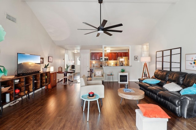 10711 Kirkside Dr, Houston, TX 77096 - living area featuring vaulted ceiling, a ceiling fan, and dark wood-type flooring