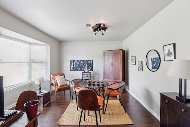 10711 Kirkside Dr, Houston, TX 77096 - dining space with dark wood-type flooring and baseboards