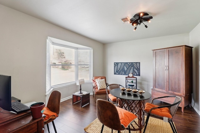 10711 Kirkside Dr, Houston, TX 77096 - dining space with wood finished floors, a desk, and baseboards