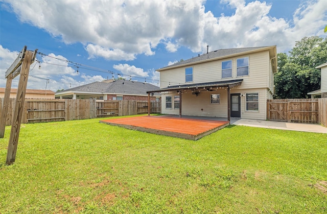 10307 Collin Park, Houston, TX 77075 - back of property featuring a wooden deck and a patio