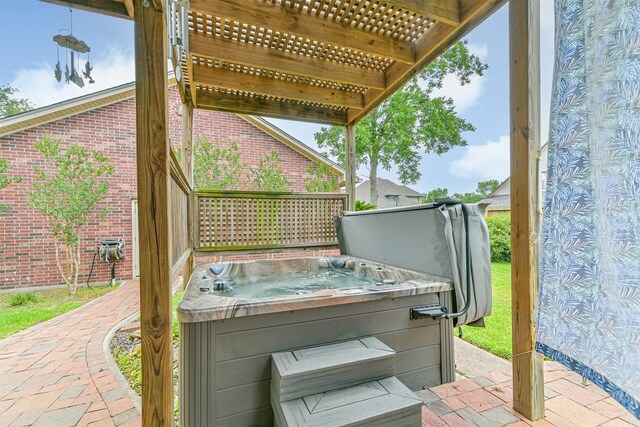 610 Bayou Bend Dr, Deer Park, TX 77536 - view of patio with a hot tub