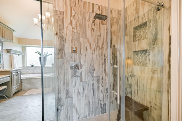 610 Bayou Bend Dr, Deer Park, TX 77536 - bathroom with a bath, a marble finish shower, tile patterned floors, and vanity