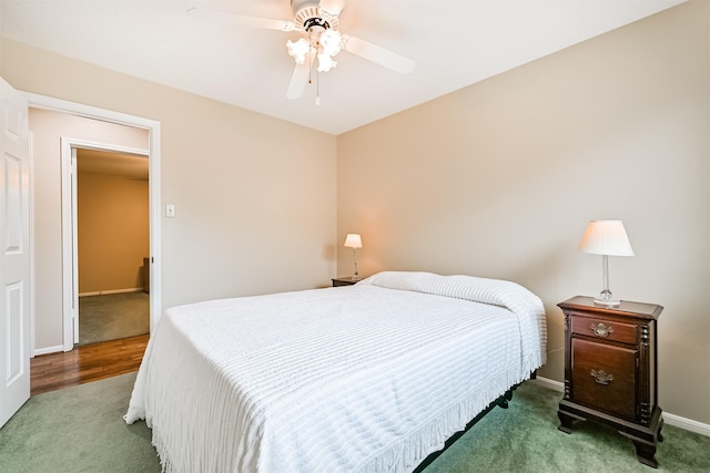 610 Bayou Bend Dr, Deer Park, TX 77536 - bedroom with carpet, baseboards, and a ceiling fan