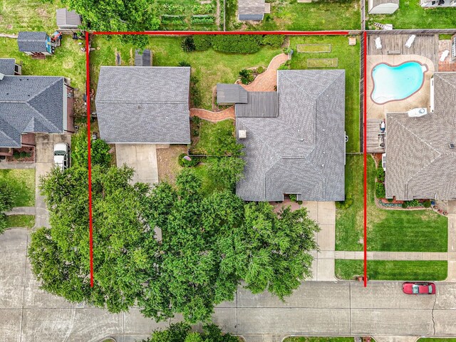 610 Bayou Bend Dr, Deer Park, TX 77536 - aerial view of property and surrounding area with property boundaries highlighted and a pool