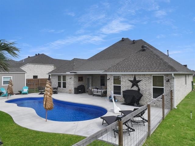 14845 Norma Jane Ln, Beaumont, TX 77713 - view of swimming pool featuring a patio area and an outdoor hangout area
