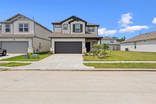 21487 Austell Pond Dr, Porter, TX 77365 - view of front facade with board and batten siding, an attached garage, driveway, stone siding, and central air condition unit