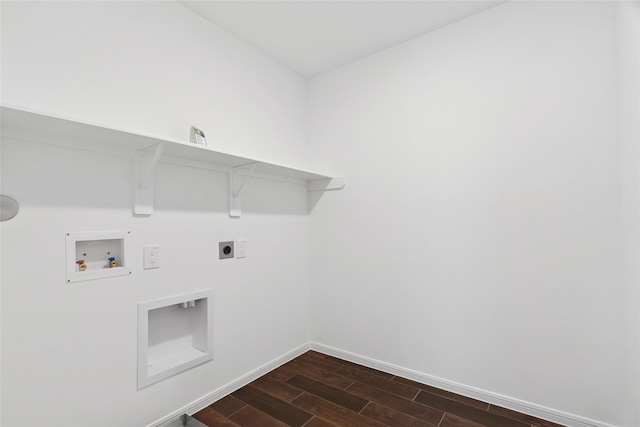 21487 Austell Pond Dr, Porter, TX 77365 - washroom featuring dark wood-style floors, washer hookup, electric dryer hookup, and baseboards