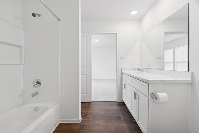 21487 Austell Pond Dr, Porter, TX 77365 - bathroom featuring vanity, wood finished floors, and bathing tub / shower combination