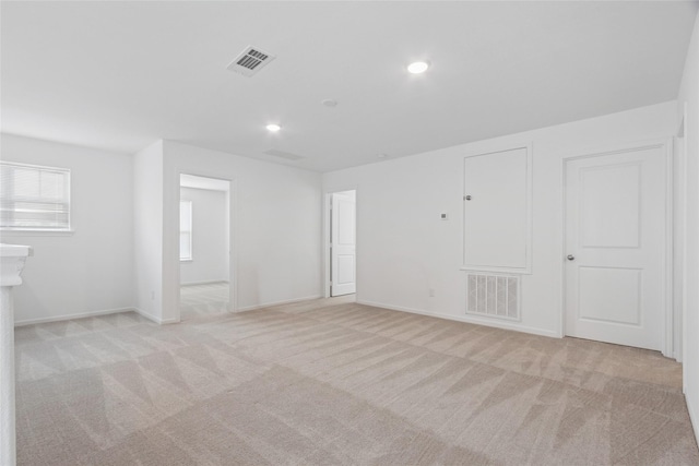 21487 Austell Pond Dr, Porter, TX 77365 - unfurnished room featuring light colored carpet, recessed lighting, and baseboards
