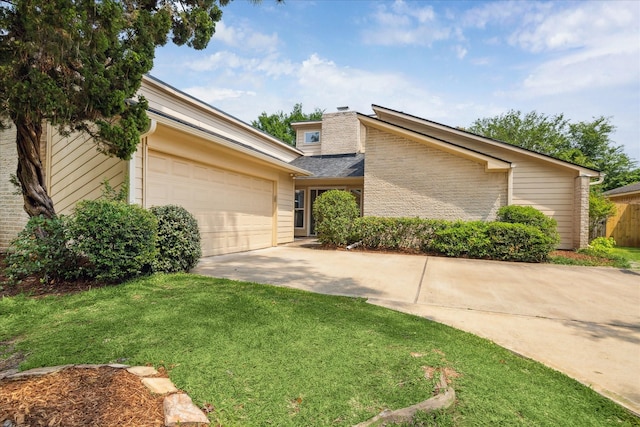 2719 Williams Grant St, Sugar Land, TX 77479 - mid-century modern home with driveway, an attached garage, a front yard, and a chimney