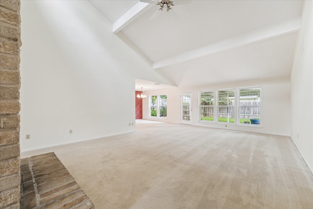 2719 Williams Grant St, Sugar Land, TX 77479 - unfurnished living room with a chandelier, carpet flooring, beam ceiling, high vaulted ceiling, and baseboards