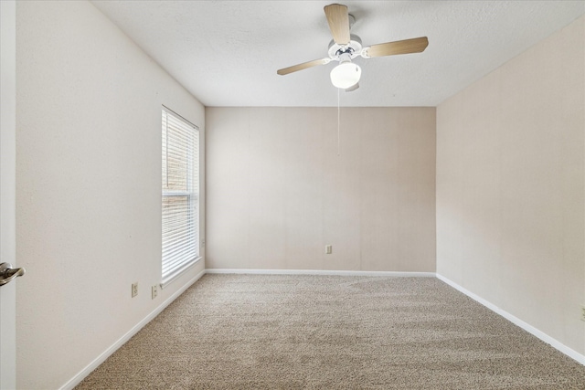 2719 Williams Grant St, Sugar Land, TX 77479 - spare room featuring carpet floors, a ceiling fan, baseboards, and a textured ceiling