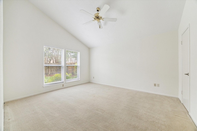 2719 Williams Grant St, Sugar Land, TX 77479 - spare room with light carpet, a ceiling fan, vaulted ceiling, and baseboards