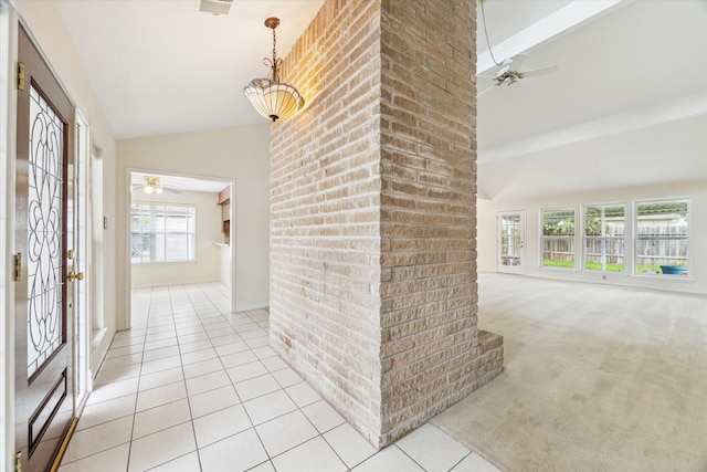 2719 Williams Grant St, Sugar Land, TX 77479 - hallway with light tile patterned floors, light colored carpet, and high vaulted ceiling