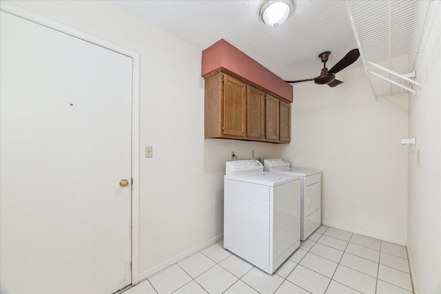 2719 Williams Grant St, Sugar Land, TX 77479 - laundry room with washing machine and clothes dryer, ceiling fan, cabinet space, light tile patterned flooring, and baseboards
