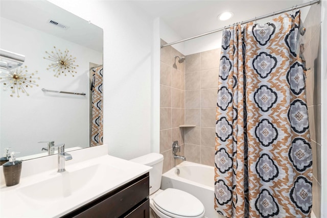 8219 Molasses Way, Rosharon, TX 77583 - bathroom featuring toilet, vanity, shower / bath combo with shower curtain, and recessed lighting