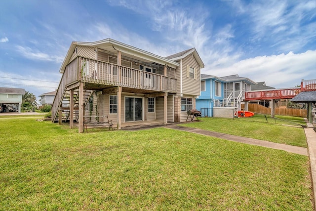457 Pompano St, Bayou Vista, TX 77563 - back of house featuring stairway and a deck