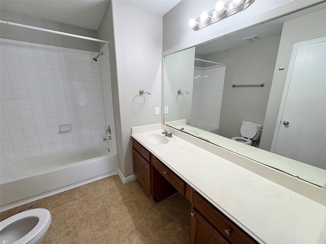 2662 Kiplands Way Dr, Houston, TX 77014 - bathroom featuring toilet, vanity, shower / tub combination, and tile patterned floors