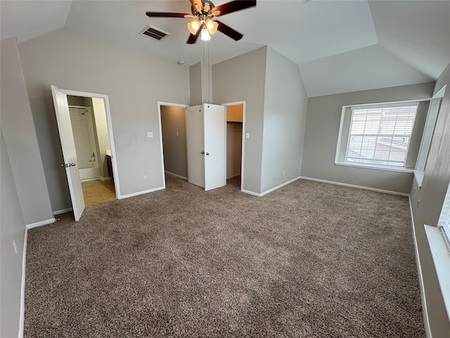 2662 Kiplands Way Dr, Houston, TX 77014 - unfurnished bedroom with lofted ceiling, carpet flooring, baseboards, ensuite bathroom, and a spacious closet