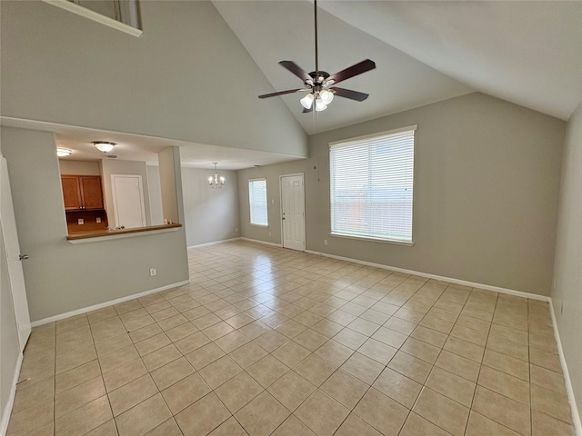 2662 Kiplands Way Dr, Houston, TX 77014 - unfurnished living room featuring lofted ceiling, a chandelier, light tile patterned floors, ceiling fan, and baseboards