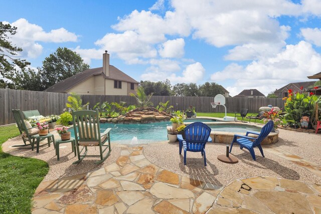 5234 Teal Way, Baytown, TX 77523 - view of pool featuring a fenced backyard and a patio area