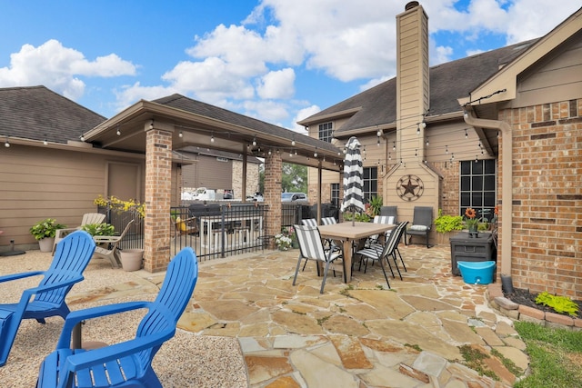 5234 Teal Way, Baytown, TX 77523 - view of patio / terrace featuring outdoor dining area