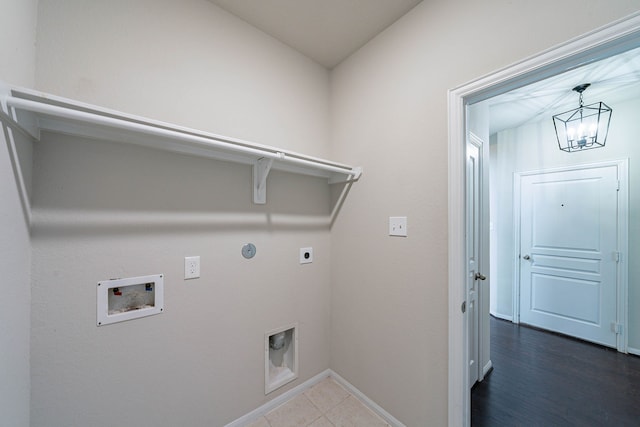 16659 Bluefin St, Crosby, TX 77532 - laundry area with hookup for an electric dryer, baseboards, hookup for a washing machine, a chandelier, and gas dryer hookup