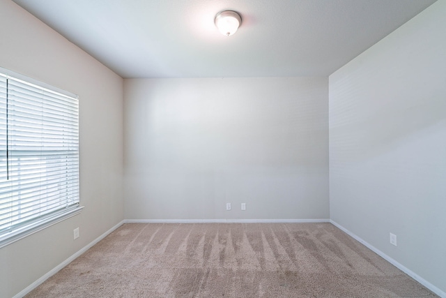 16659 Bluefin St, Crosby, TX 77532 - carpeted empty room with baseboards