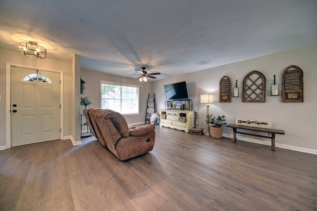 507 Sandra Dr, Brenham, TX 77833 - living room featuring ceiling fan, dark wood-style flooring, and baseboards
