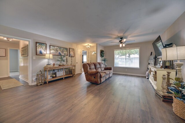 507 Sandra Dr, Brenham, TX 77833 - living room with wood finished floors, a ceiling fan, and baseboards