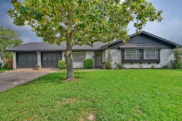 507 Sandra Dr, Brenham, TX 77833 - ranch-style house with a garage, driveway, brick siding, a front yard, and roof with shingles