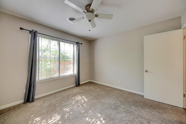 507 Sandra Dr, Brenham, TX 77833 - unfurnished room featuring carpet flooring, ceiling fan, and baseboards