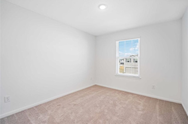 10721 Bancroft Park Ln, Houston, TX 77075 - unfurnished room with light carpet and baseboards