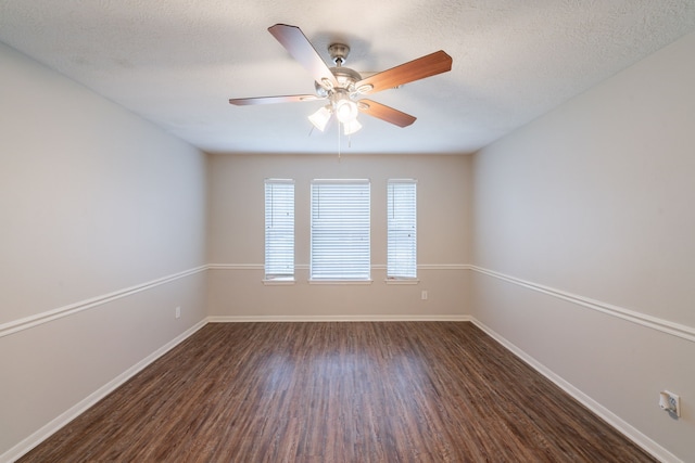 19914 Big Timber Dr, Humble, TX 77346 - unfurnished room featuring dark wood finished floors and ceiling fan