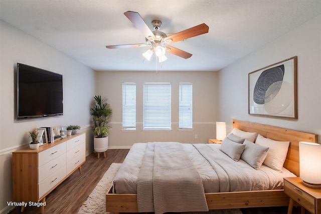 19914 Big Timber Dr, Humble, TX 77346 - bedroom featuring wood finished floors and ceiling fan