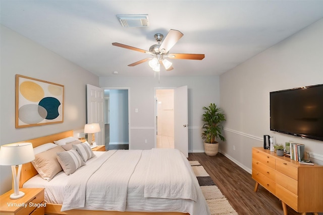 19914 Big Timber Dr, Humble, TX 77346 - bedroom featuring wood finished floors and a ceiling fan